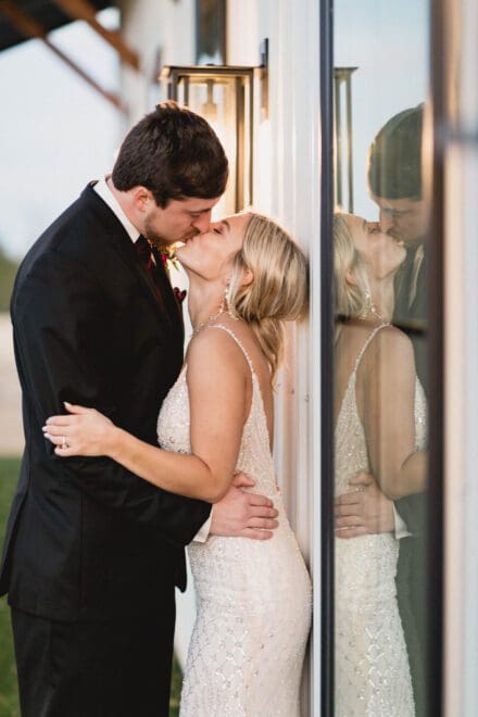 a man and woman kissing. photography-styles
