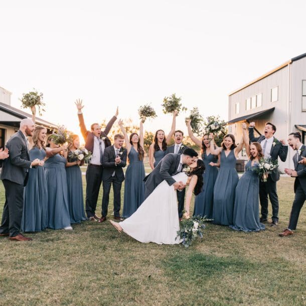 a group of people in grey dresses and suits. Photo-Retouching