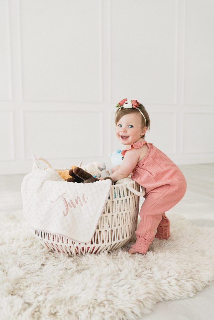 a baby in a basket. Portrait Photography Portrait Photographers by Bushel + Peck Photo